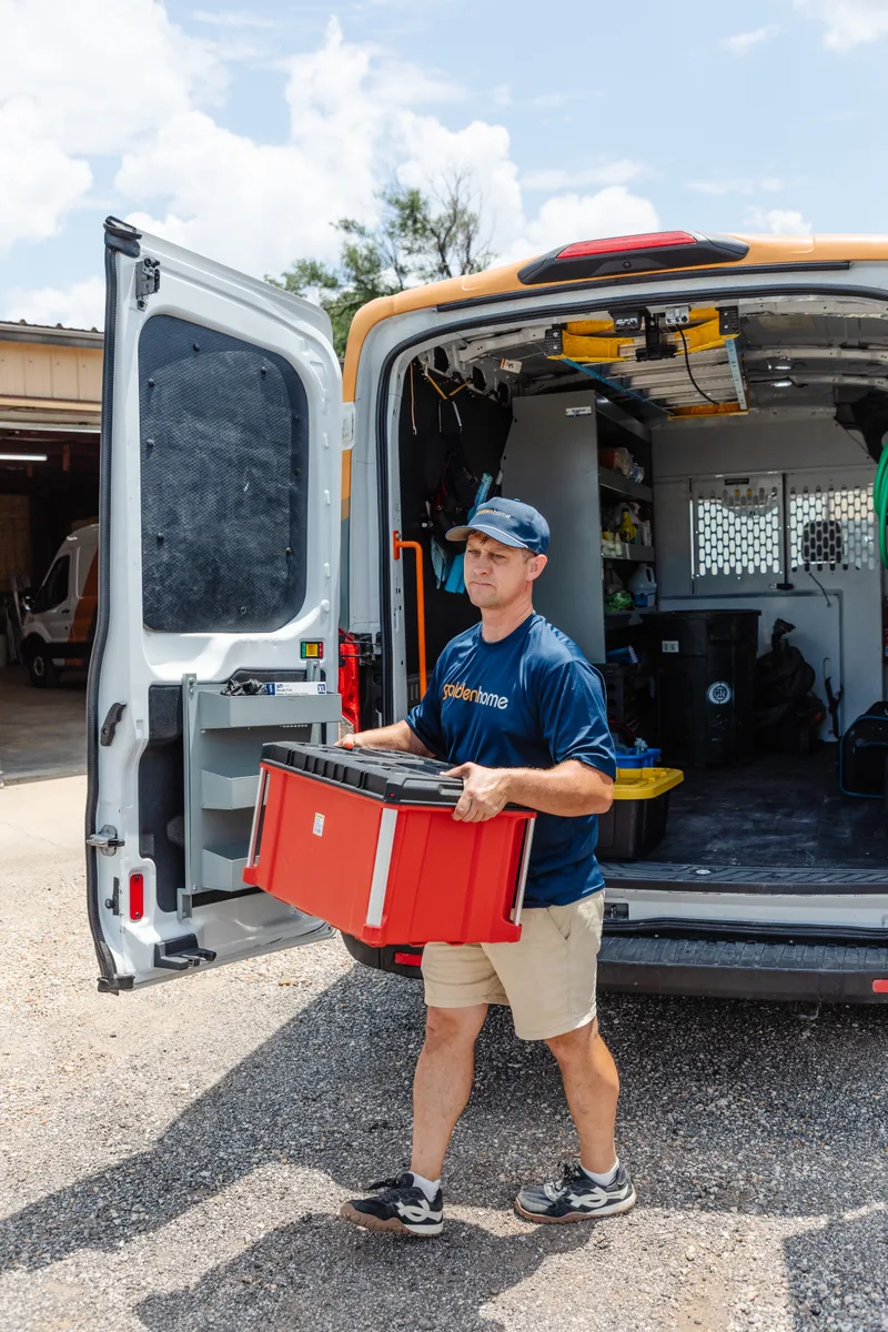 GoldenHome technician preparing tools in a service van before a Topeka handyman visit